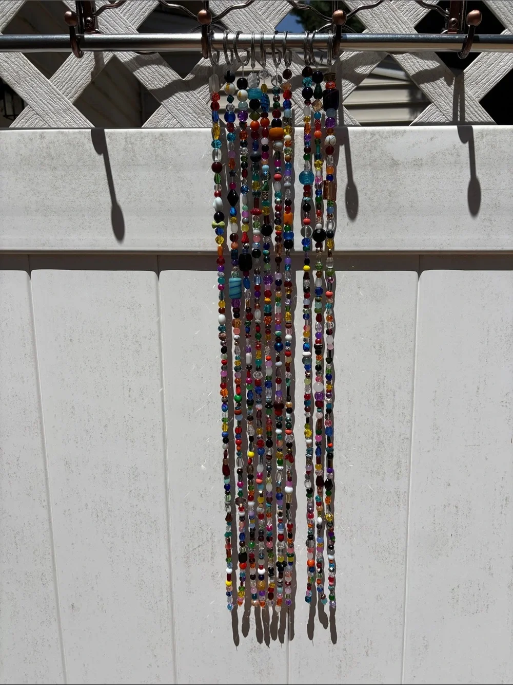 10 strands 26 inches long made with glass & crystal beads